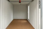 Container di stoccaggio da 20 piedi con apertura a porta sezionale da garage. – Image 5