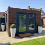Container marittimi convertiti – Casetta da giardino ristrutturata di 12 m² – Finitura in legno e antracite – Image 3